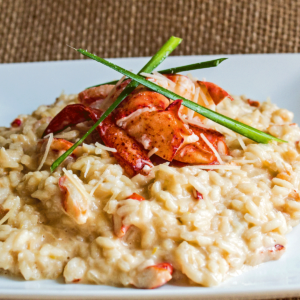 Risoto de damasco e gorgonzola com lagosta na manteiga da terra